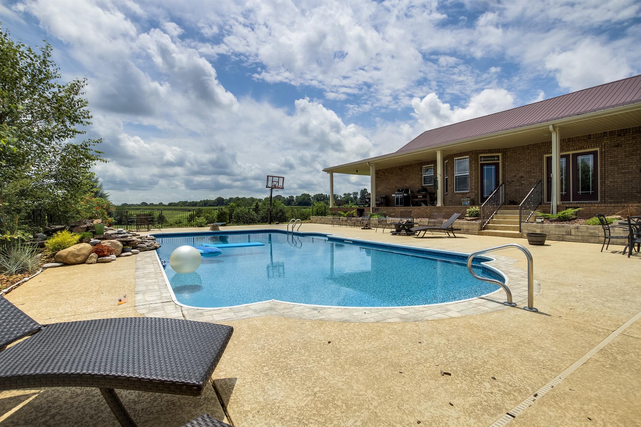 4599 Gamble Road Cedar Hill, TN 37032 - Photo 24 of 25 a view of a swimming pool with outdoor seating