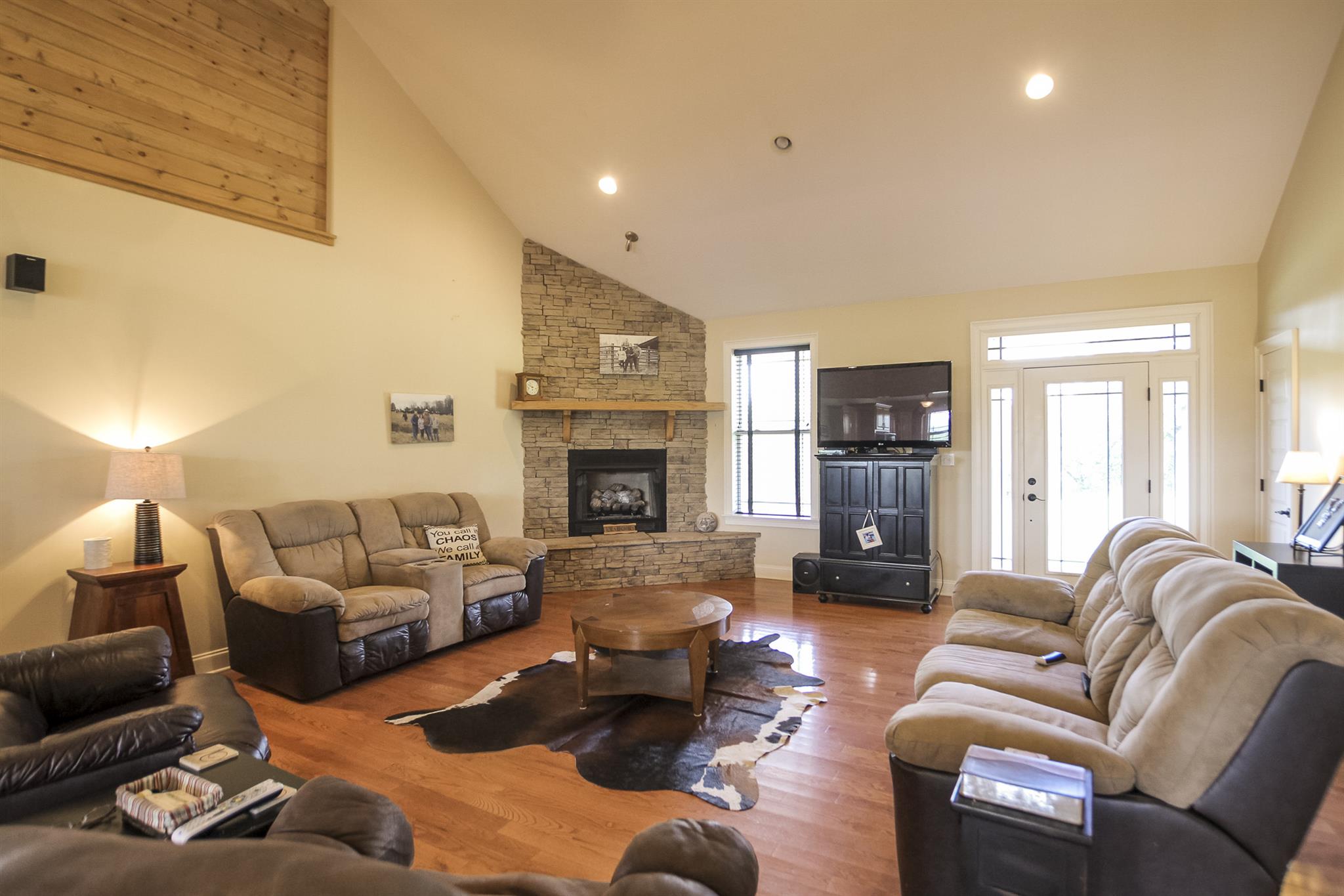 4599 Gamble Road Cedar Hill, TN 37032 - Photo 6 of 25 a living room with furniture fireplace and a flat screen tv