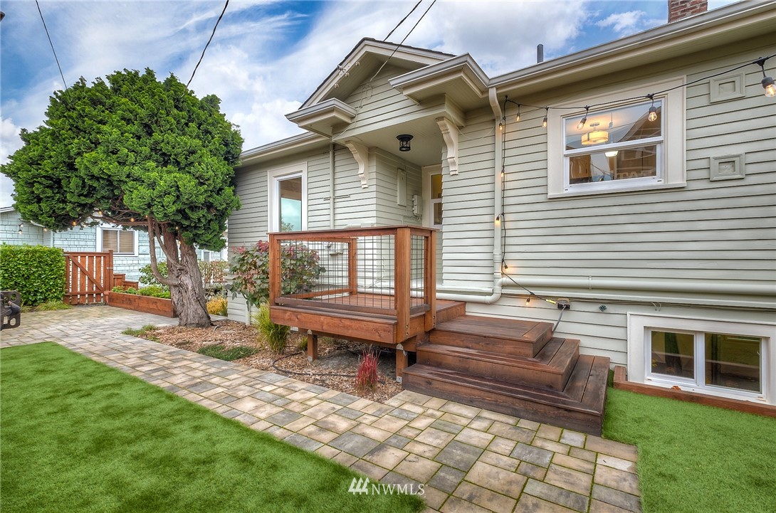 452 North 65th Street Seattle, WA 98103 - Photo 19 of 31 a view of a house with backyard and sitting area