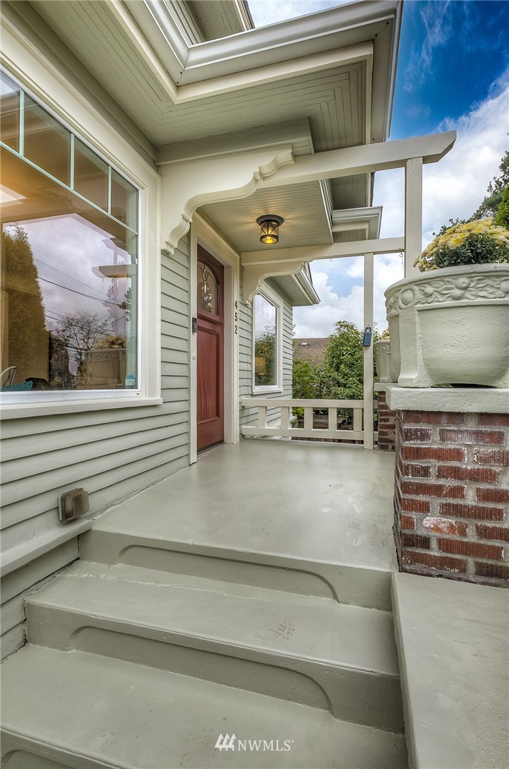 452 North 65th Street Seattle, WA 98103 - Photo 3 of 31 a view of a building with sitting area