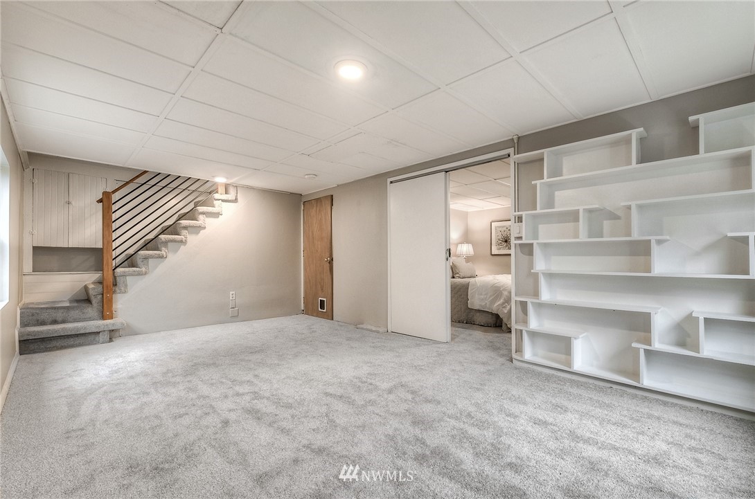 452 North 65th Street Seattle, WA 98103 - Photo 22 of 31 a view of an empty room with a window