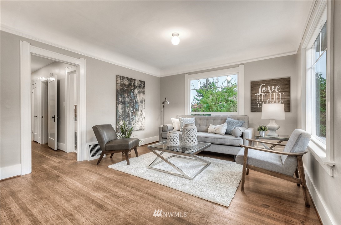 452 North 65th Street Seattle, WA 98103 - Photo 10 of 31 a living room with furniture and a large window