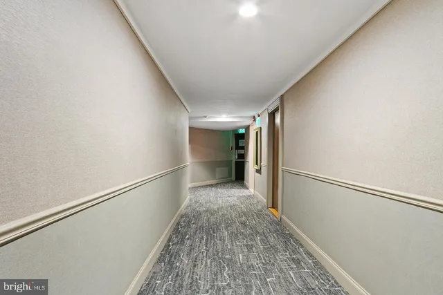 a view of hallway with stairs