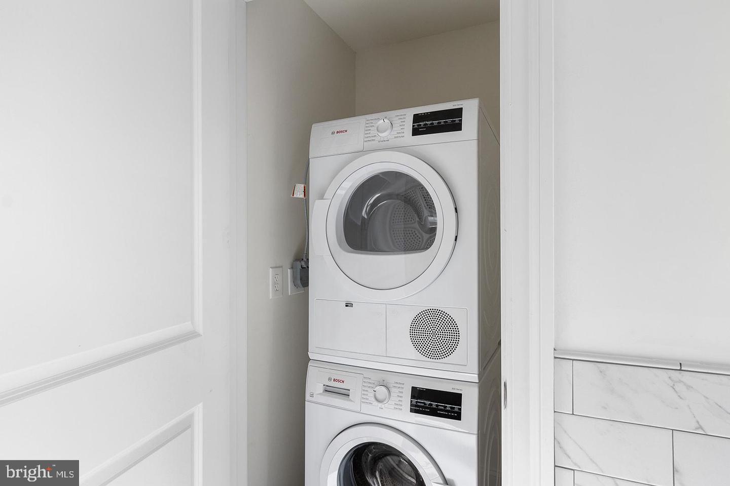 2201 Pennsylvania Avenue, Unit 1204B Philadelphia, PA 19130 - Photo 13 of 46 a utility room with dryer and washer