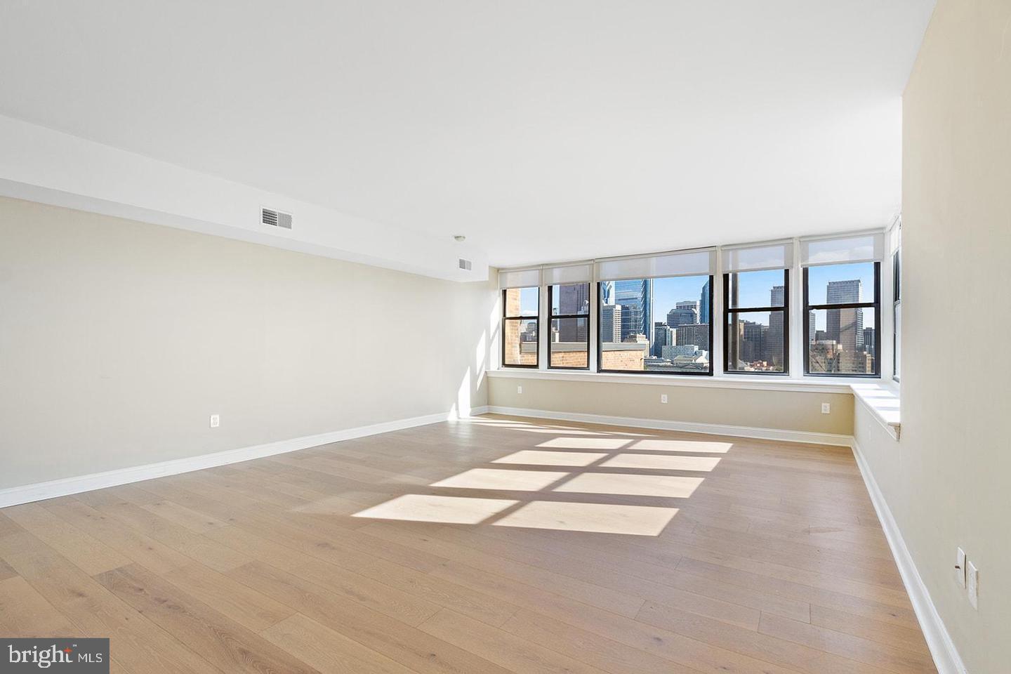 2201 Pennsylvania Avenue, Unit 1204B Philadelphia, PA 19130 - Photo 14 of 46 a view of an empty room with a window
