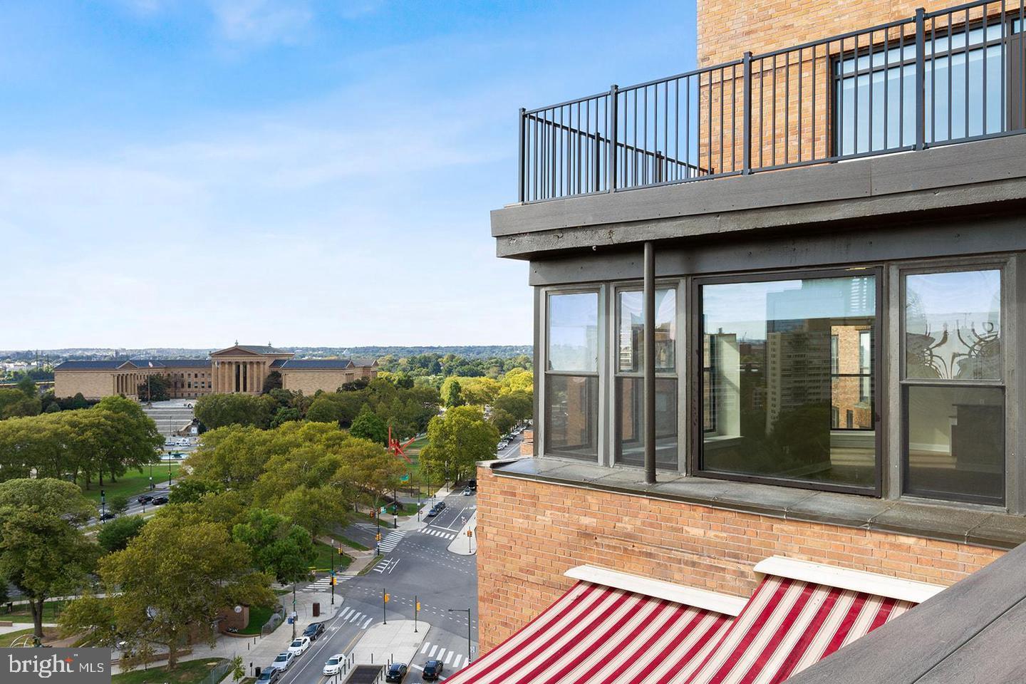 2201 Pennsylvania Avenue, Unit 1204B Philadelphia, PA 19130 - Photo 20 of 46 a view of a house with porch and wooden floor