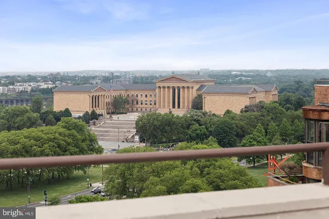 a view of a lake from a balcony