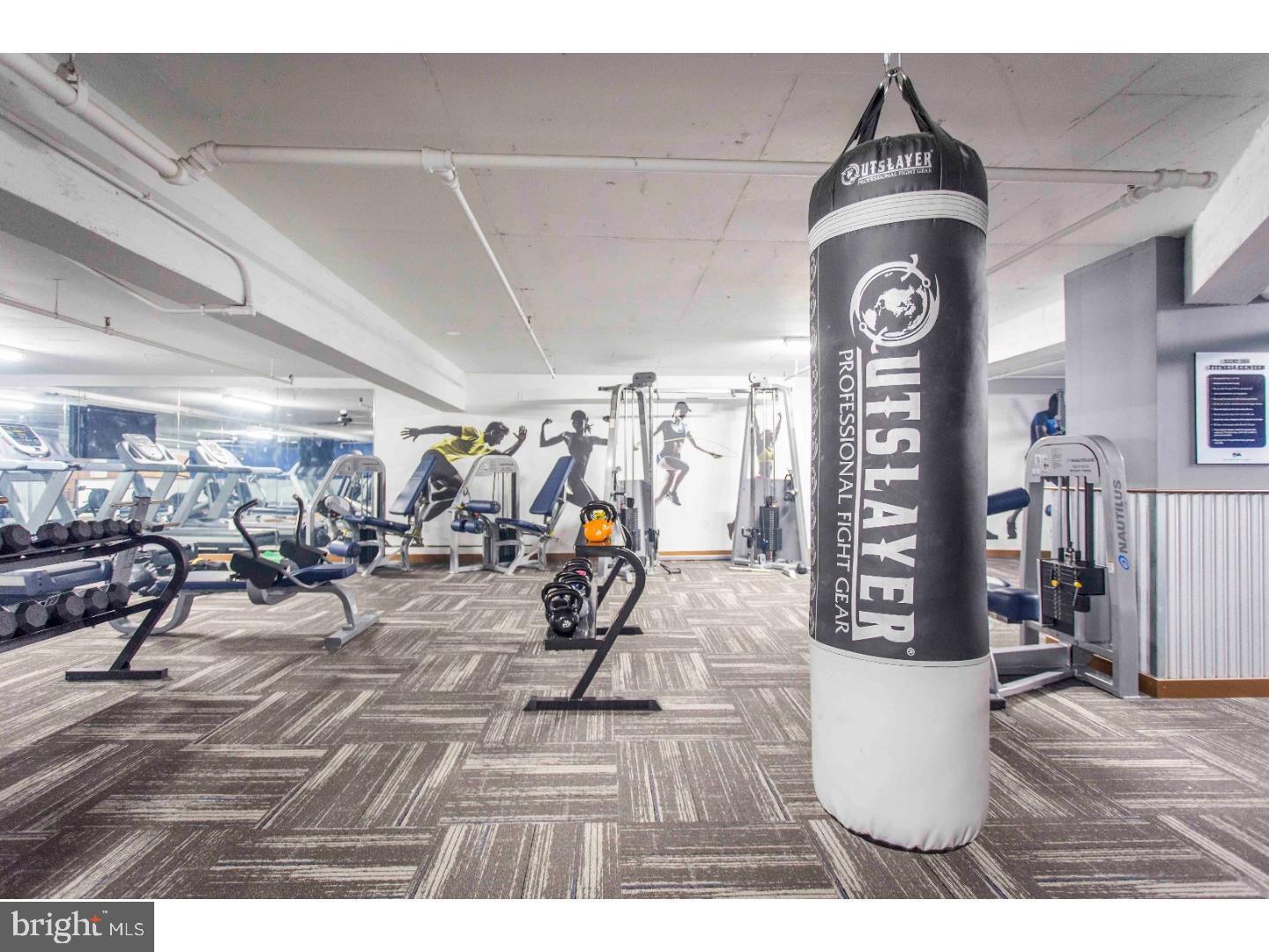 2201 Pennsylvania Avenue, Unit 1204B Philadelphia, PA 19130 - Photo 38 of 46 a view of a room with gym equipment