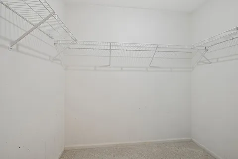 a view of a room with racks on the wall