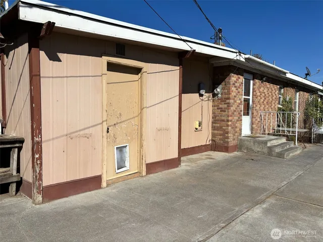 a view of a house with a street