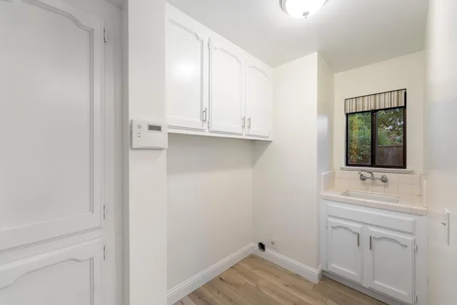 a view of bathroom with dual sinks