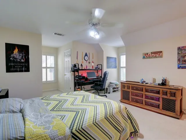 a bed room with a bed and furniture