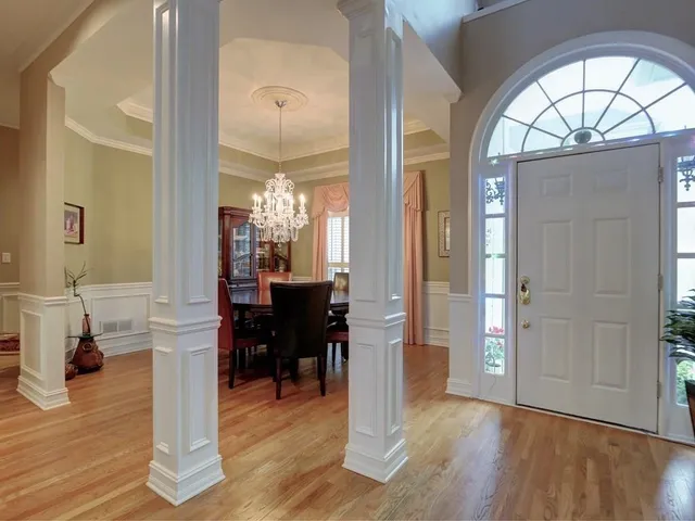 a view of a living room and dining room