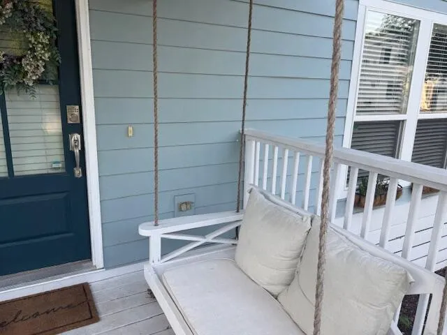 a view of balcony with a potted plant