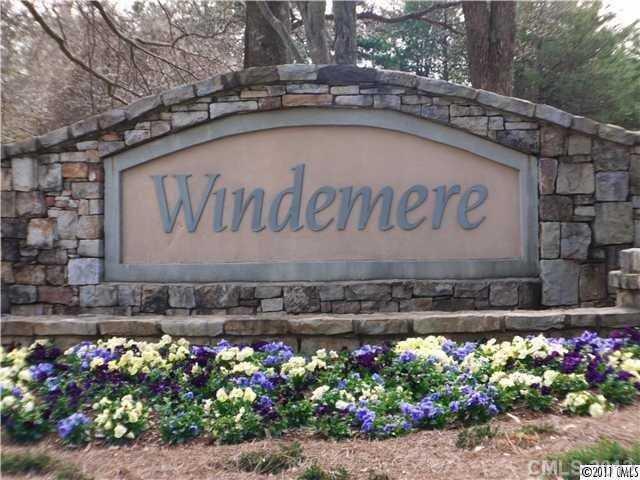 22 Windemere Isle Road Statesville, NC 28677 - Photo 5 of 5 a sign that is sitting in front of flowers