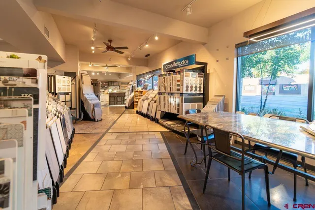 a view of a living room and dining room
