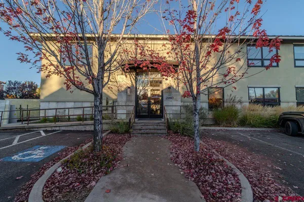 an aerial view of houses with yard