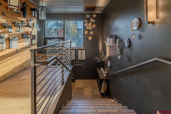 a room with gym equipment and a large window