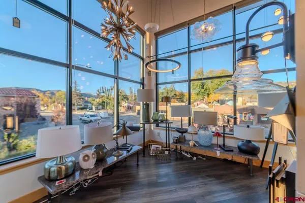 a front view of a building with a yellow door