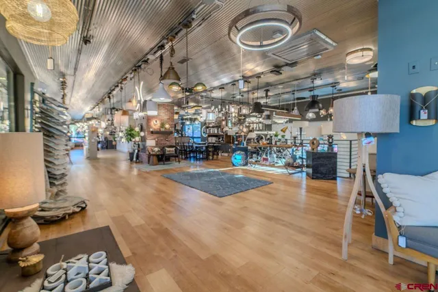 a bathroom with a sink mirror and toilet