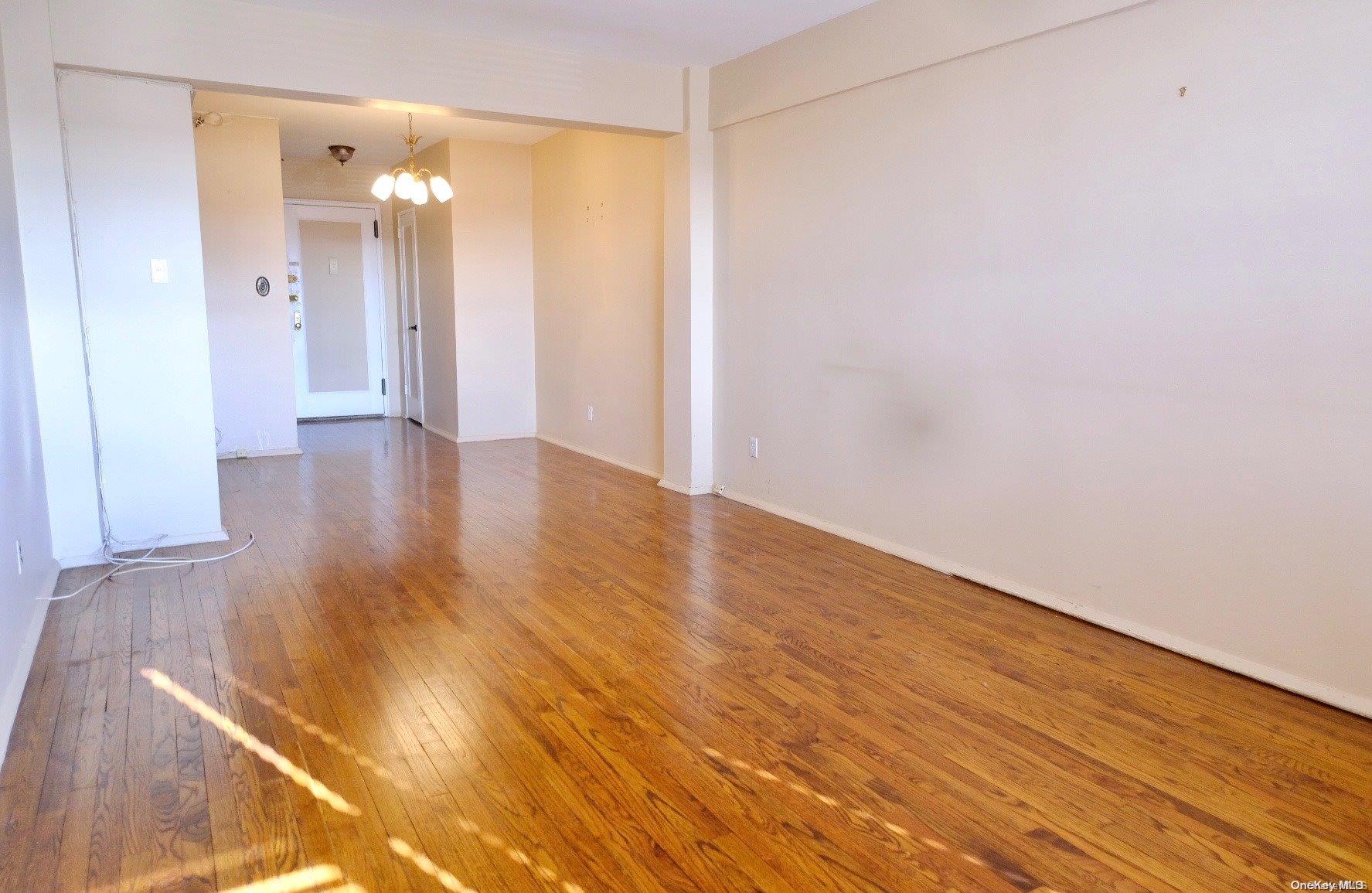 141-10 25th Road, Unit 6D Queens, NY 11354 - Photo 1 of 1 a view of a room with wooden floor