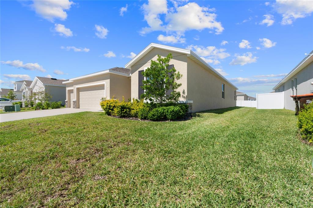 8260 Southwest 59th Avenue Ocala, FL 34476 - Photo 16 of 20 a view of a house with a yard