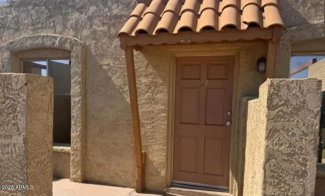 a front view of a house with a door