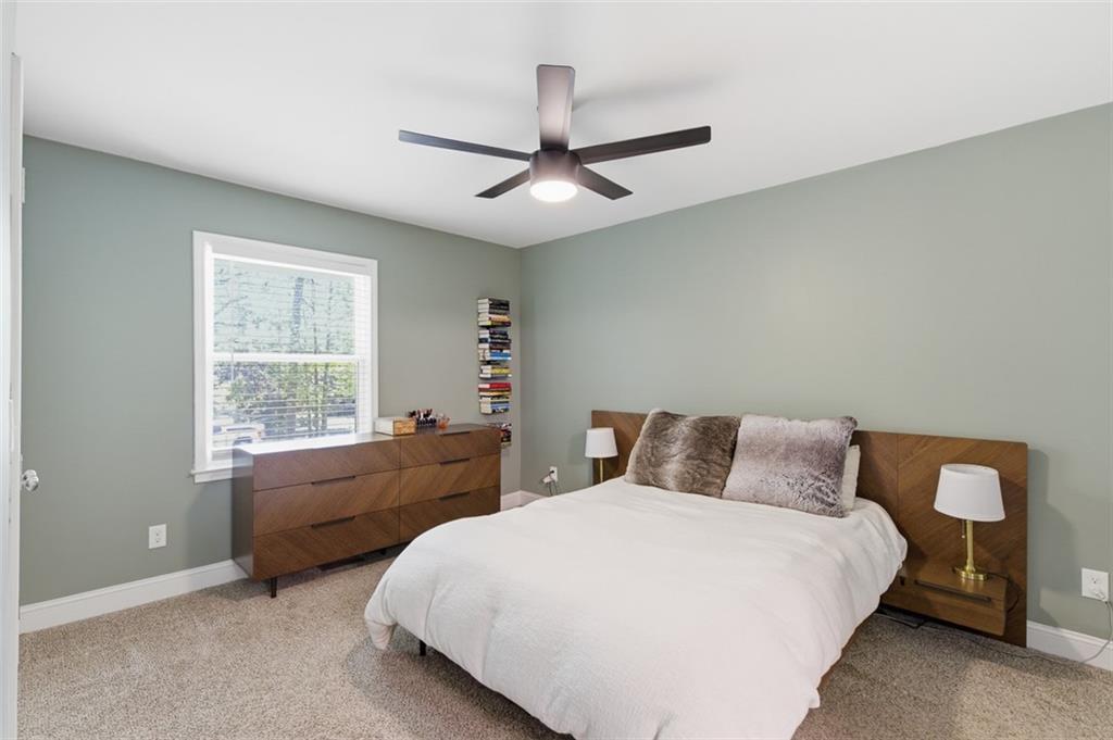 3180 Rehoboth Drive Decatur, GA 30033 - Photo 19 of 36 a bedroom with a bed and a window