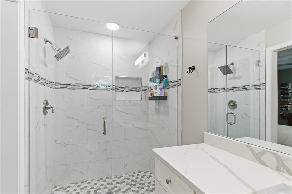3180 Rehoboth Drive Decatur, GA 30033 - Photo 24 of 36 a bathroom with a bathtub sink and shower