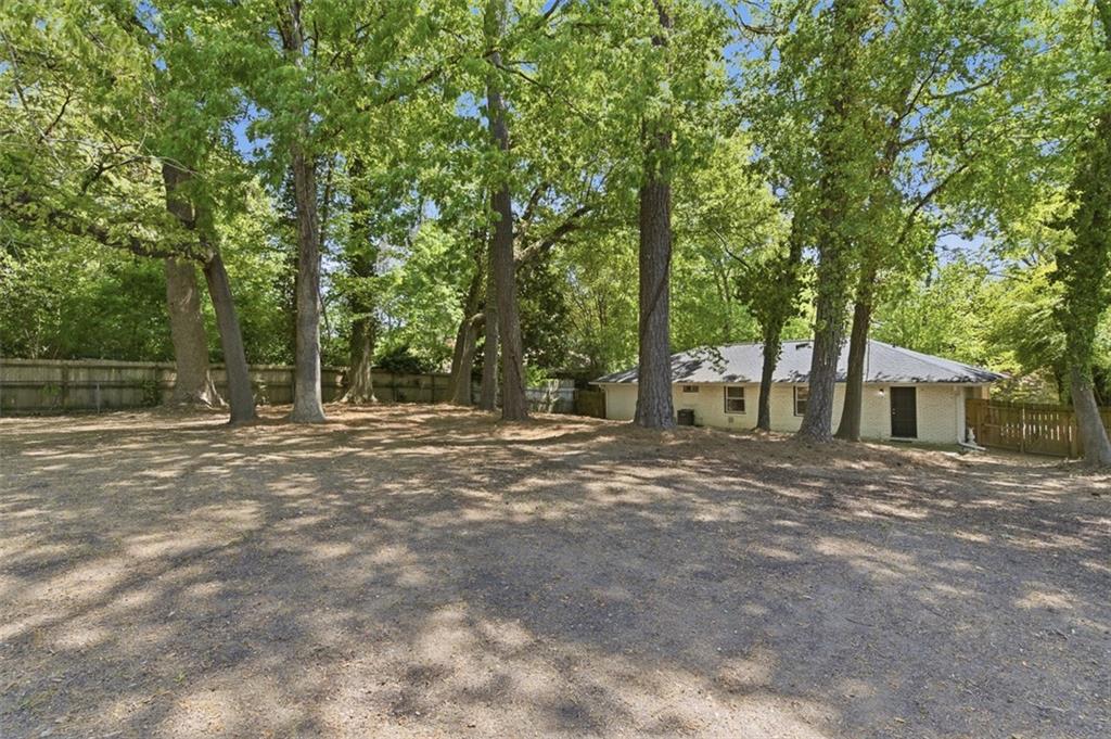 3180 Rehoboth Drive Decatur, GA 30033 - Photo 34 of 36 a view of a field with trees in the background