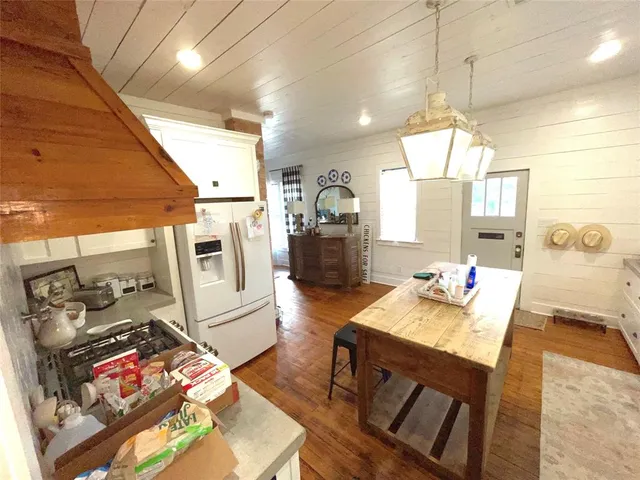 a view of a workspace with furniture