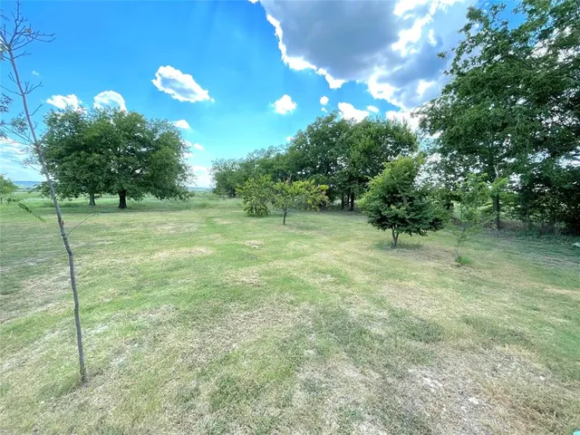 a view of outdoor space and yard