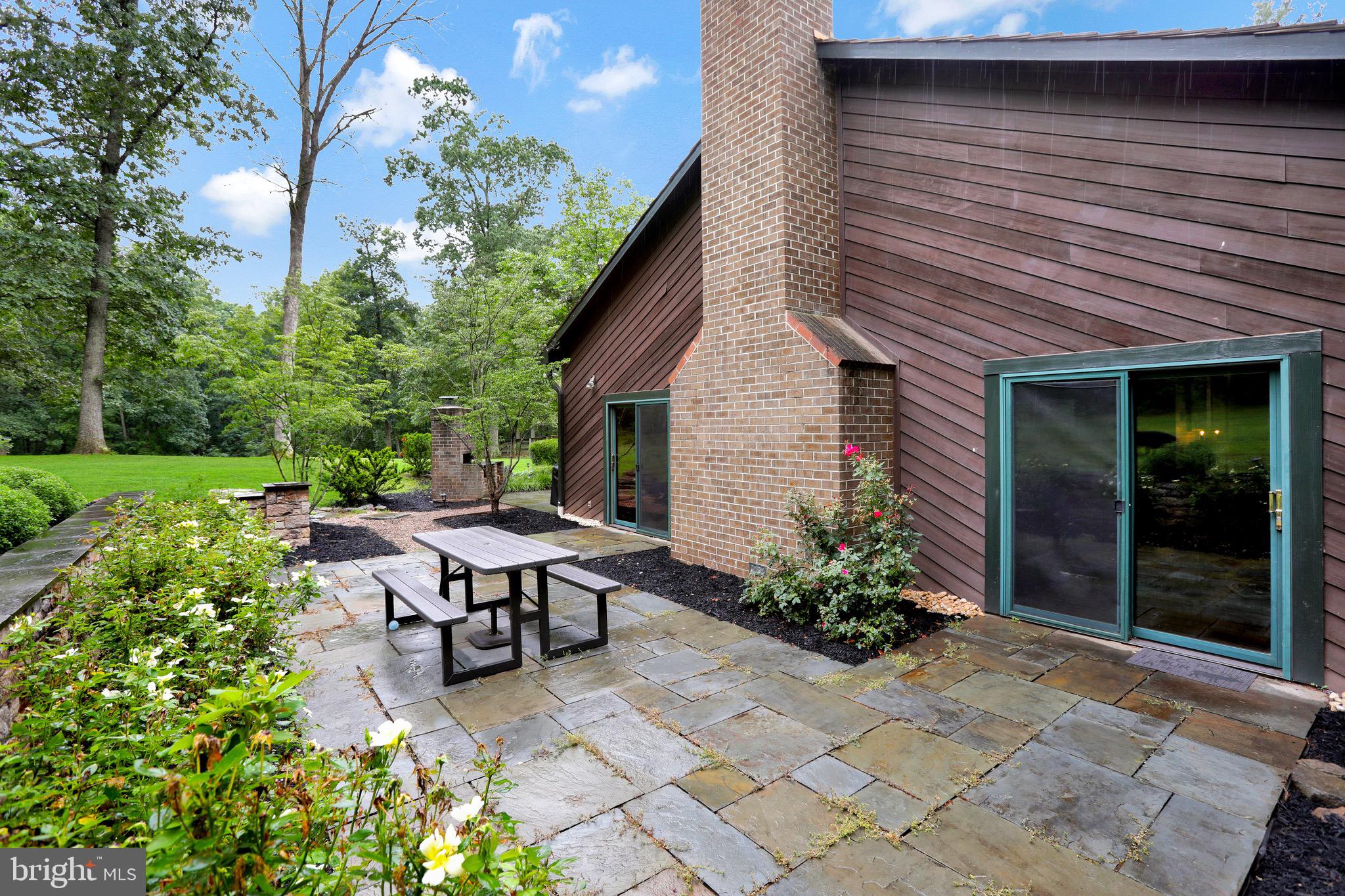 43351 Spinks Ferry Road Leesburg, VA 20176 - Photo 12 of 48 First of two rear stone patios.