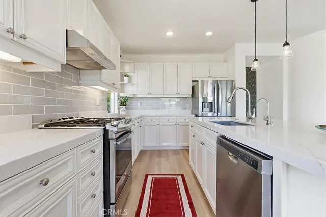 an empty room with ceiling fan