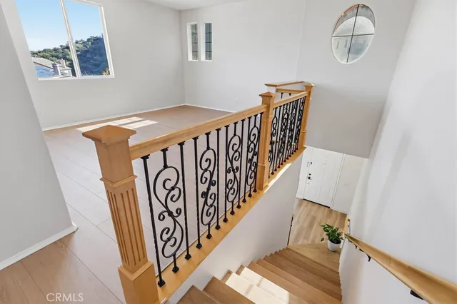 an empty room with ceiling fan