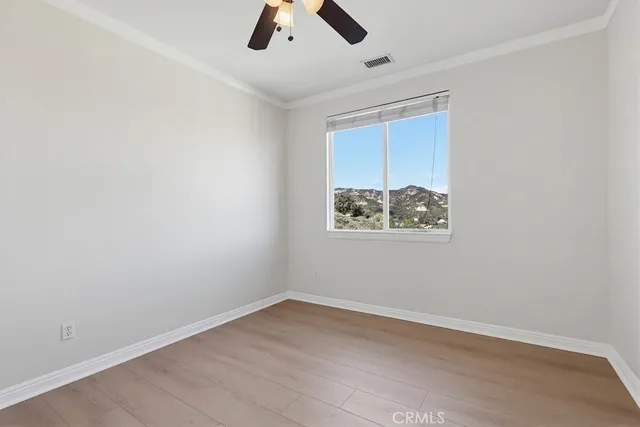 a bathroom with a sink vanity and mirror