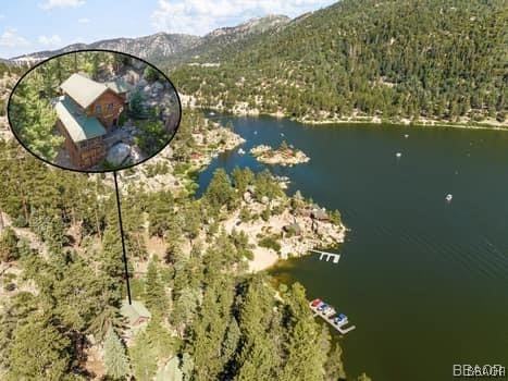 46 Spring Road Big Bear Lake, CA 92315 - Photo 2 of 43 an aerial view of a house with a lake view