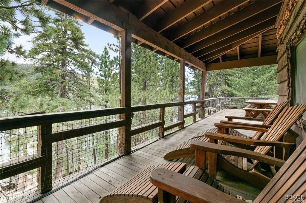 46 Spring Road Big Bear Lake, CA 92315 - Photo 3 of 43 a view of a balcony with wooden floor