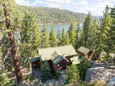 46 Spring Road Big Bear Lake, CA 92315 - Photo 33 of 43 an aerial view of a house with yard and mountain view in back