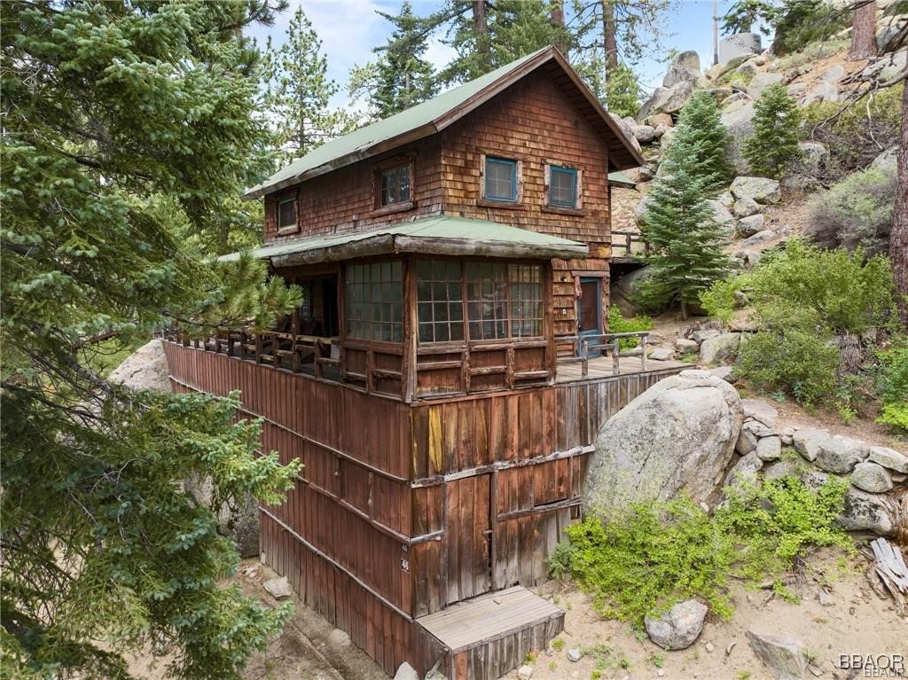 46 Spring Road Big Bear Lake, CA 92315 - Photo 42 of 43 a front view of a house with balcony