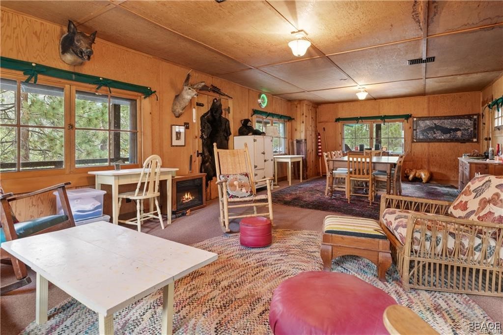 46 Spring Road Big Bear Lake, CA 92315 - Photo 6 of 43 a living room with furniture a wooden floor and next to a window