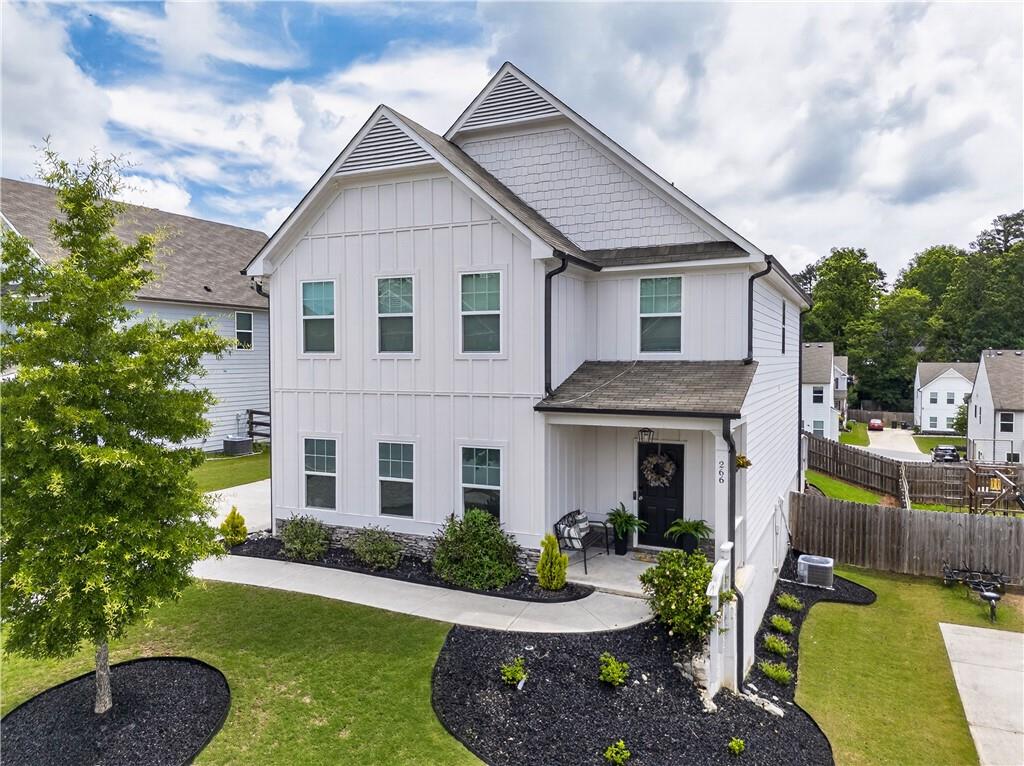 266 Shoals Bridge Road Acworth, GA 30102 - Photo 1 of 43 a front view of a house with a yard