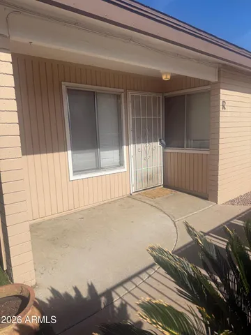 a view of a backyard of a house