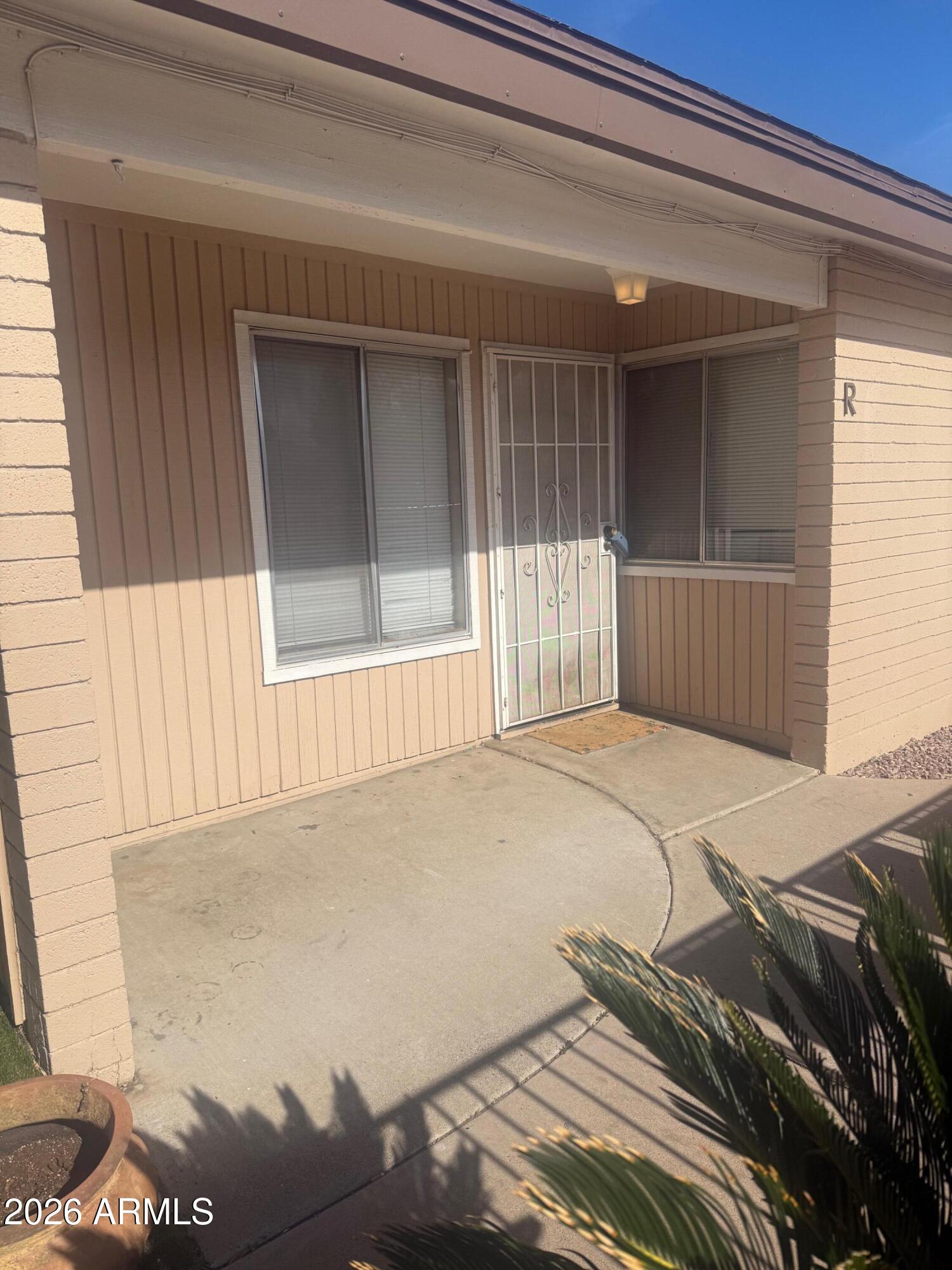 a view of a backyard of a house