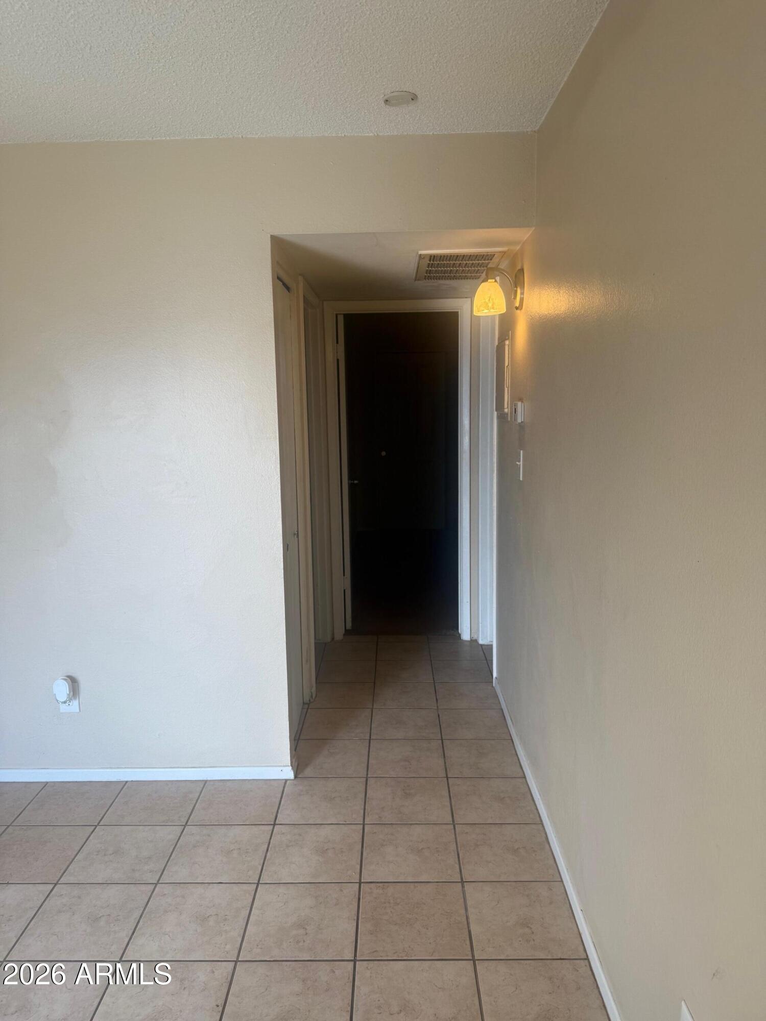 1622 East Campbell Avenue, Unit R Phoenix, AZ 85016 - Photo 7 of 15 a view of hallway with a hallway