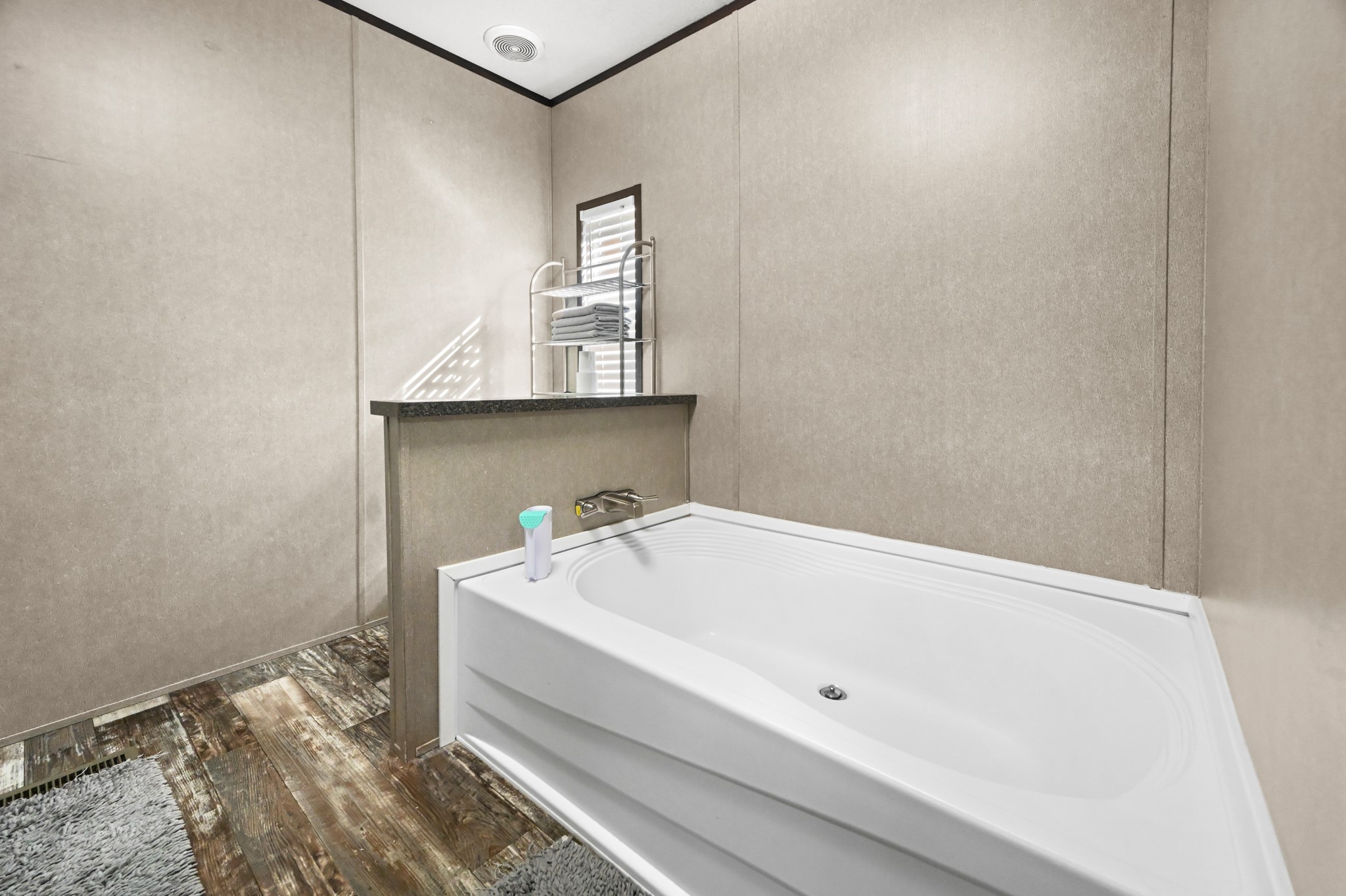 6026 Carter Road Waller, TX 77484 - Photo 20 of 34 a bathroom with a sink and a bathtub