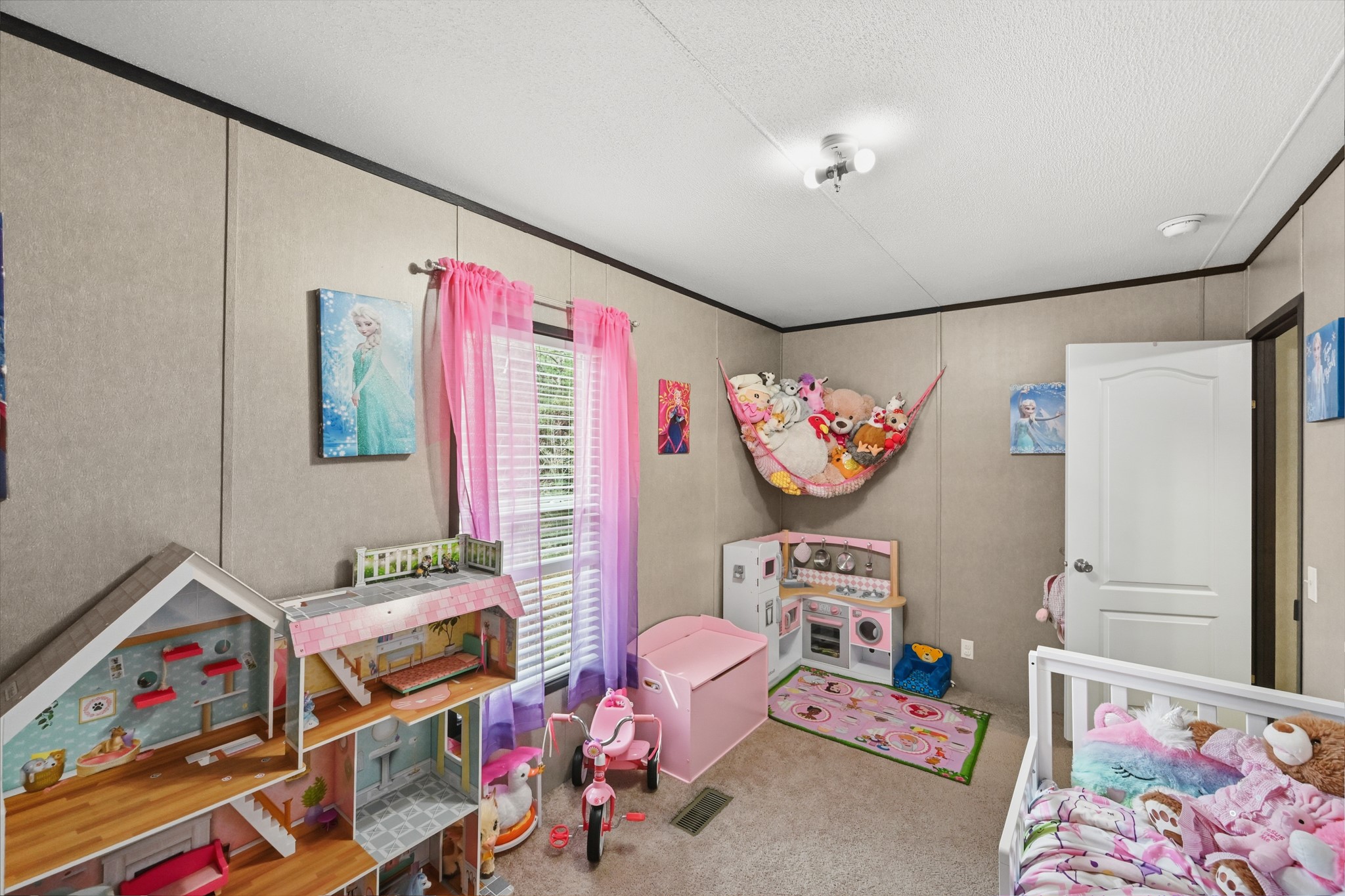 6026 Carter Road Waller, TX 77484 - Photo 23 of 34 a bedroom with furniture and a bed