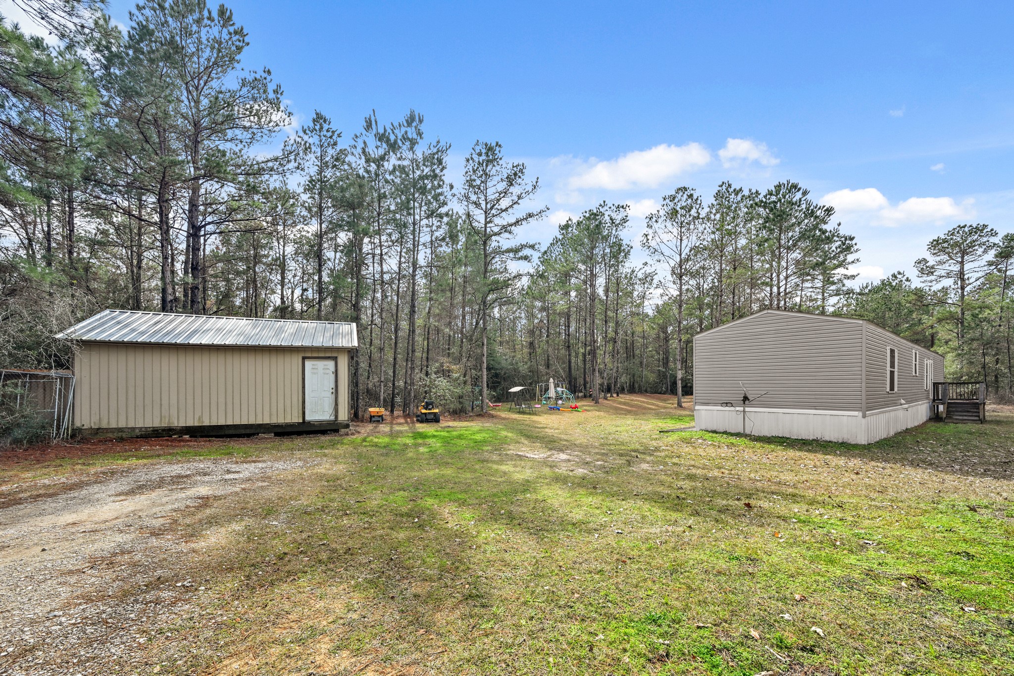 6026 Carter Road Waller, TX 77484 - Photo 6 of 34 a view of a backyard with tree s