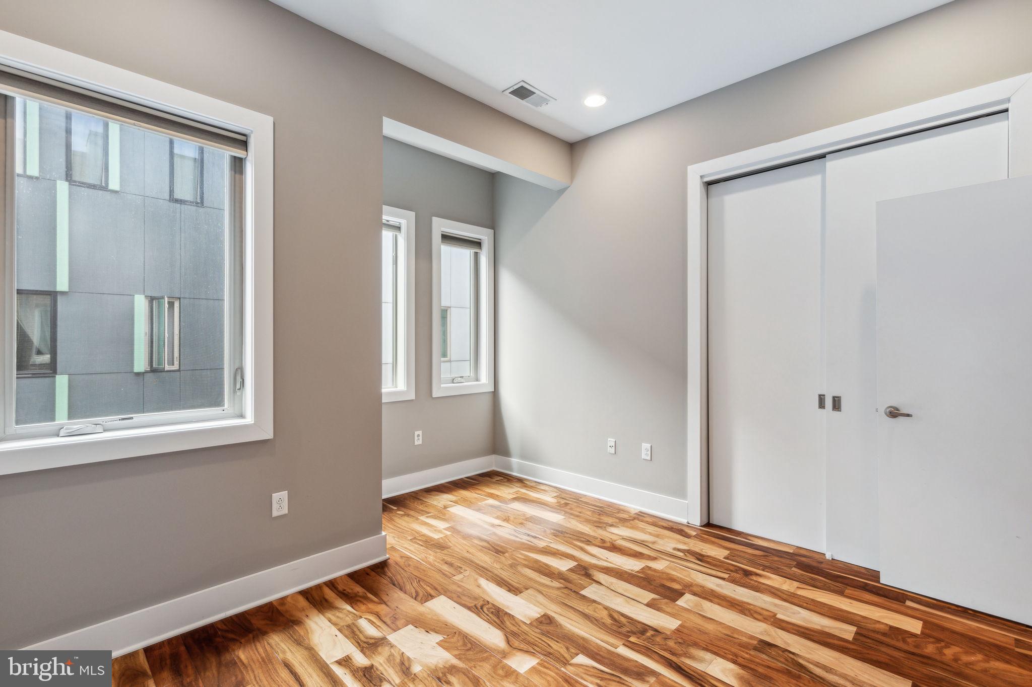 832 North 3rd Street, Unit 7 Philadelphia, PA 19123 - Photo 32 of 52 a view of empty room with wooden floor and fan