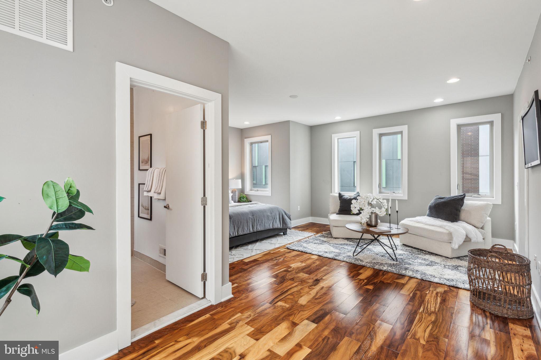 832 North 3rd Street, Unit 7 Philadelphia, PA 19123 - Photo 38 of 52 a living room with furniture and a wooden floor